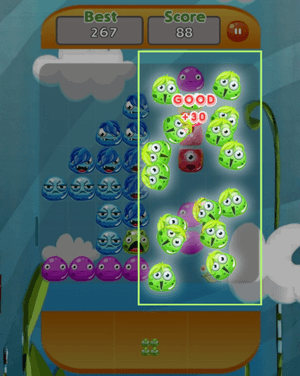 Block Puzzle Game 8x8 gameplay showing a group of colourful monster blocks being cleared from the board